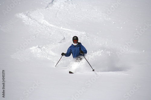 telemark skier in fresh powder