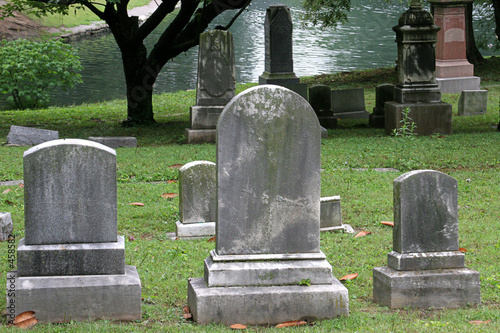 gravestones by lake