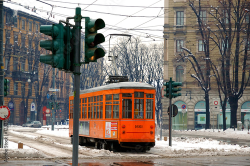 tram in milano with snow