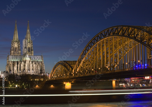 cologne cathedral with passing barge