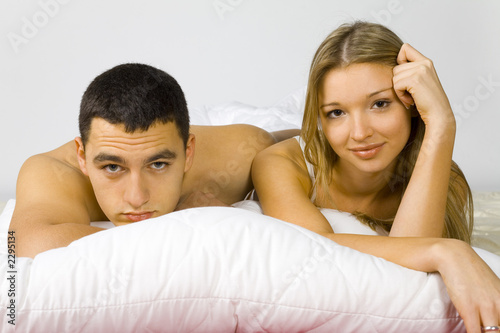 young couple in the bed