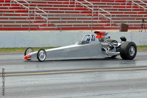dragster heads down the track