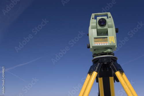 land surveying under blue sky