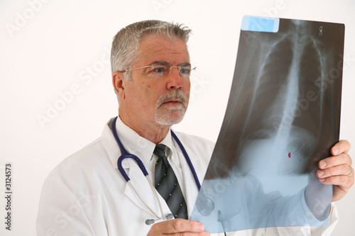 doctor examining an x-ray