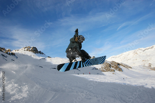 jumping snowboarder