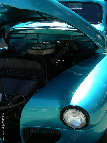 Blue 1941 antique roadster with open hood