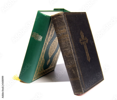 Bible and Koran leaning on each other