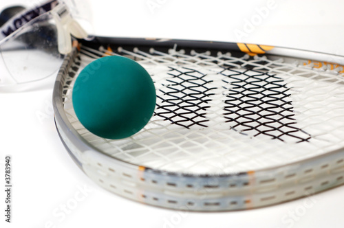 Close up shot of racquetball gear on a white background.