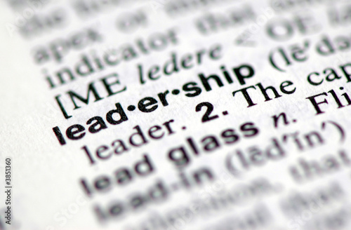 A macro shot of the word "Leadership" from the dictionary