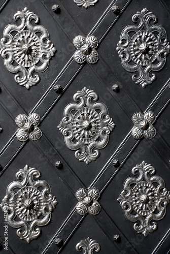 an old door decoration in one of the churches in the Prague