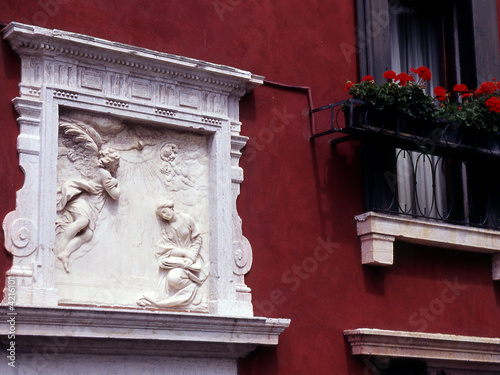 Carving and windowbox on house in Venice Italy