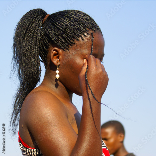 Black woman with braids during Reed Dance, Swaziland