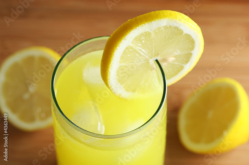 Glass of lemonade with lemon slice