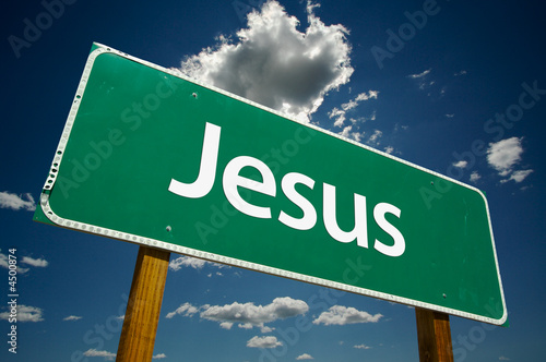 "Jesus" Road Sign with dramatic clouds and sky.