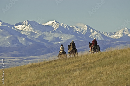 Cowboys on the range on a Montana horse ranch