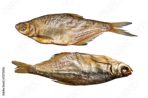 Two dried fishes. Isolated objects on a white background.