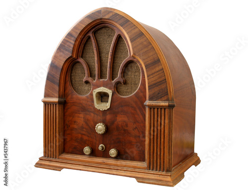 Old Wooden radio at slight angle with white background.