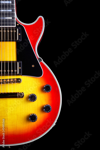 close up of les paul style electric guitar.