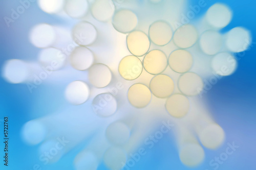 Close-up of drinking straws on blue background.