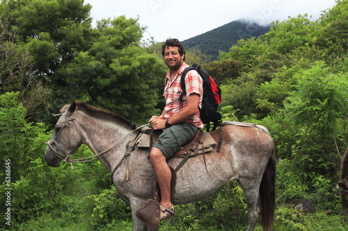 Man horseback riding in Central America