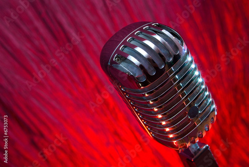 retro microphone over red background