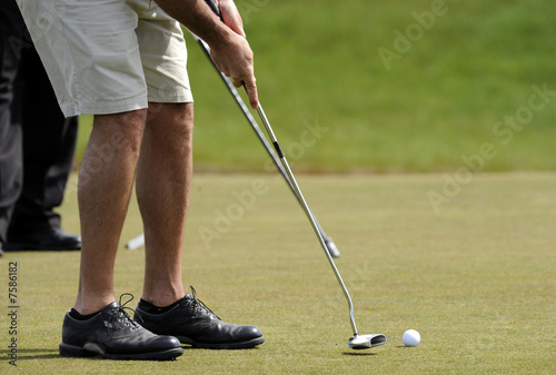 Putter, Golf Ball and Feet