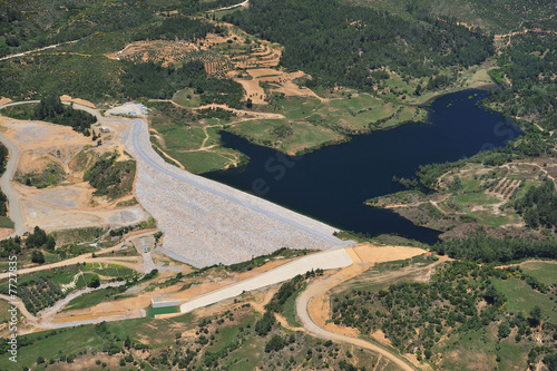 Earth dam fiilng rock barrage