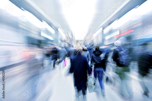 abstract zooming passengers in subway