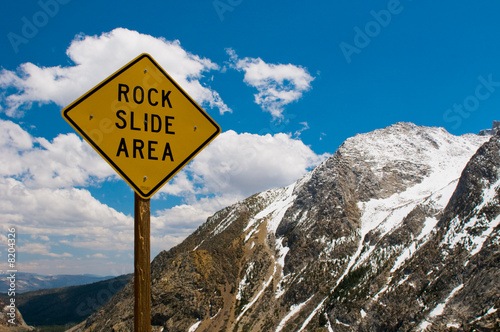 Rock slide area sign in the mountains