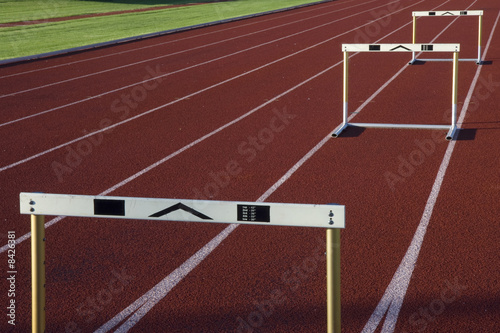 running tracks with three hurdles