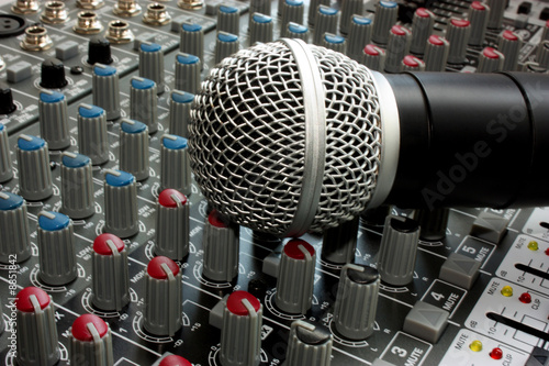 Professional vocal microphone on the mixer board