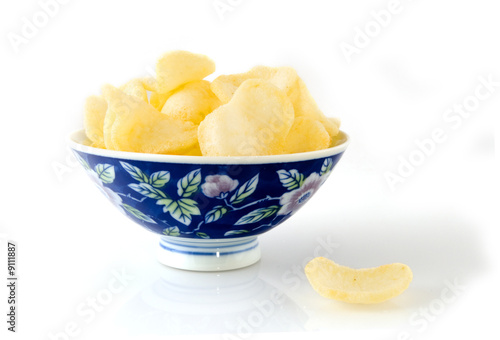 shrimp crackers in chinese blue bowl