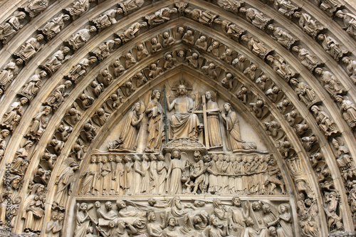Decoration above the door of Notre Dame cathedral, Paris