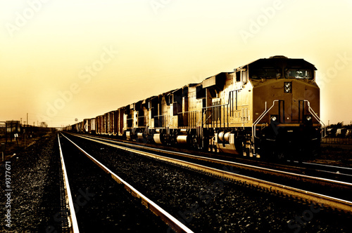 Freight train travelling through Arizona at Sunset