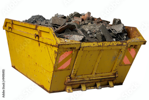 A skip full of rubble isolated over white.