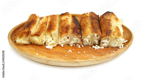 Burek cheese pie on wooden plate