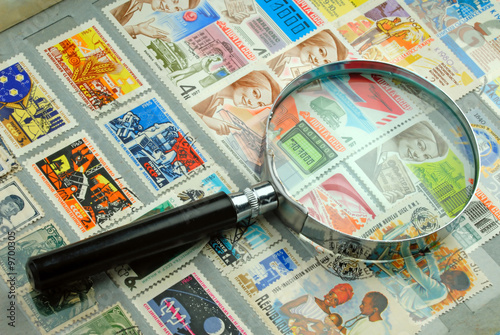 Stamps and Magnifying Glass.