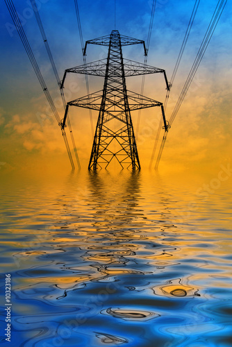Silhouette of electricity pylon with flooded water effect