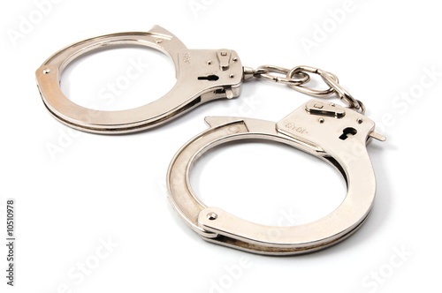 police handcuffs isolated on a white background
