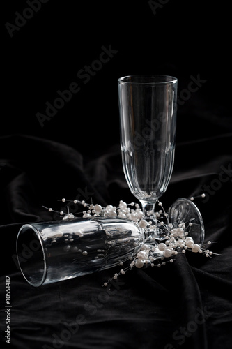Two empty champagne glasses with christmas decoration