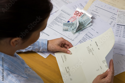 Woman with unpaid bills