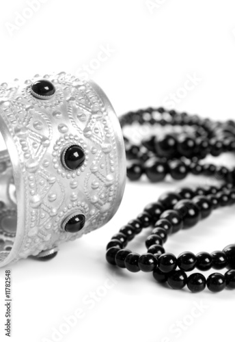 bracelet and black necklace