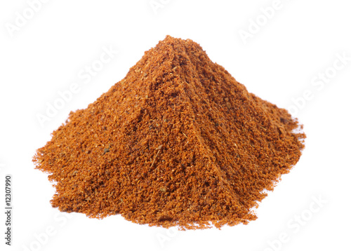 spices - pile of tandoori masala over white