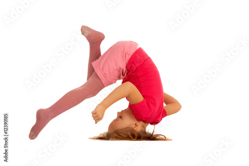 young girl during somersault