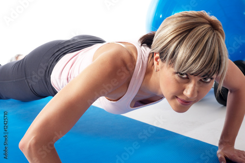 Sportswoman exercising