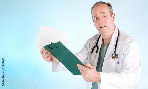 Perplexed Doctor Reading Out Disappointing Medical Test Result