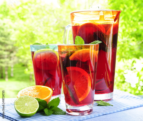 Fruit punch in pitcher and glasses