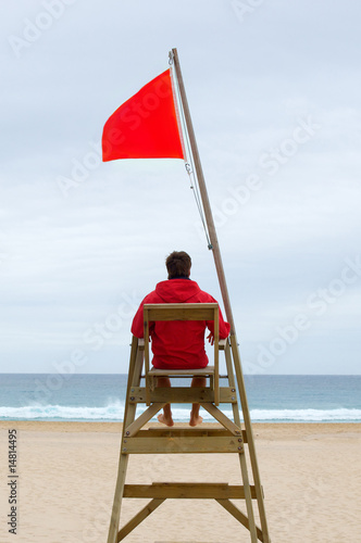 Lifeguard sitting in his chair
