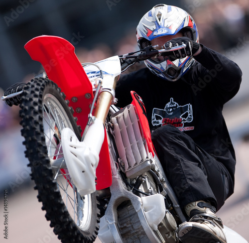 Stunt Rider pulling a wheelie