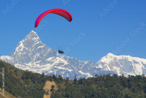 paraglide in nepal with himalaya background